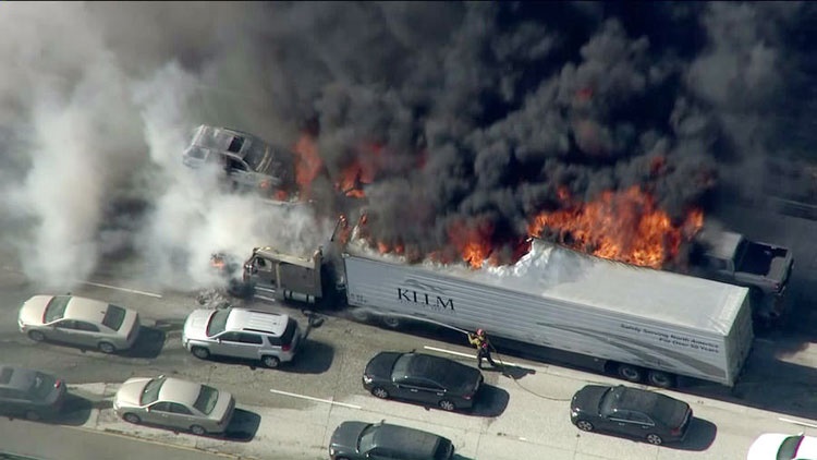 Flames sweep over freeway