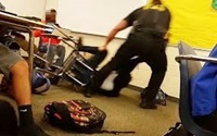خشونت افسر آمریکایی علیه دانش‌آموز دختر