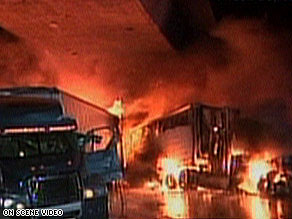 Big rigs burn inside a tunnel on California's Golden State Freeway