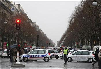 A parcel bomb explosion in central Paris killed a legal secretary and injured five others