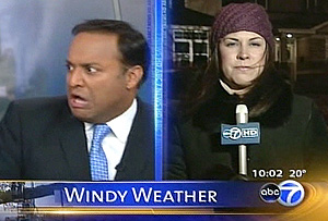 image taken from television, weekend anchor Ravi Baichwal reacts on-air as a vehicle crashes into the TV station's studio in Chicago