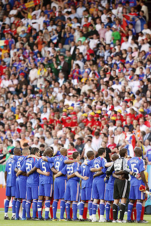 The French team listen to the national anthems before their Euro 2008 Championships Group C football match France vs. Roumania