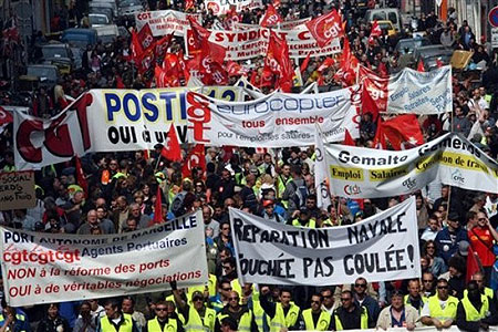Several thousand workers from public service and the private sector, demonstrate in Marseille, southern France, Thursday, March 19, 2009.