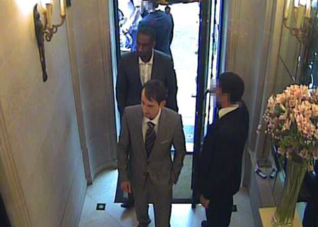 Handout image shows two men entering Graff Jewellers in London 