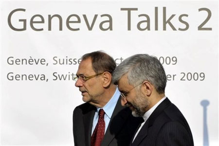 European Union foreign policy chief Javier Solana, left, stands with Iranian negotiator Saeed Jalili, right, at the opening of the Geneva talks between Iran and six world powers to discuss the Islamic republic's disputed atomic programme in Geneva, Thursday, Oct. 1, 2009. The U.S. and five other world powers began high-stakes talks Thursday with Iran to demand a freeze of its nuclear activities, with a senior U.S. official saying Washington is open to rare one-on-one talks with Iranian diplomats.