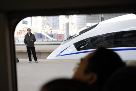  high-speed bullet train is seen pulling out of Tianjin, northern China