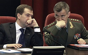 Russian President Dmitry Medvedev, left, and Interior Minister Rashid Nurgaliyev seen at a meeting of senior police officials in Moscow, Thursday, Feb. 18, 2010. President Dmitry Medvedev on Thursday ordered drastic cuts in the Interior Ministry as part of efforts to reform the nation's widely criticized police force.