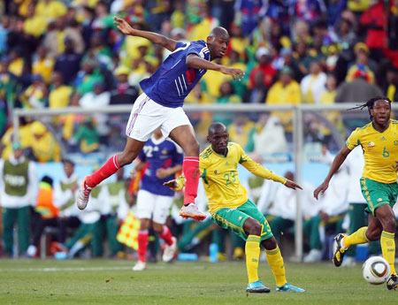 BLOEMFONTEIN, SOUTH AFRICA - JUNE 22: Abou Diaby of France gets airborn during the 2010 FIFA World Cup South Africa Group A match between France and South Africa at the Free State Stadium on June 22, 2010 in Mangaung/Bloemfontein, South Africa.