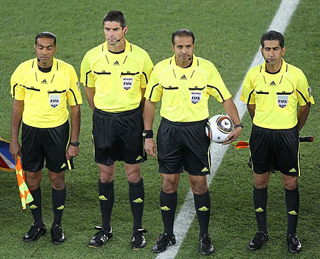 (L-r) United Arab Emirates Assistant referee Saleh Al Marzouqi, Referee Peter O Leary of New Zealand, Saudi Arabian referee Khalil Al Ghamdi , Iranian Assistant referee Hassan Kamranifar pose prior to Group A first round 2010 World Cup football match France vs Mexico on June 17, 2010 at Peter Mokaba stadium in Polokwane.