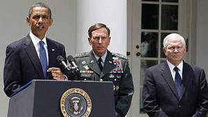 Obama announces Gen. David Petraeus, center, will replace Gen. Stanley McChrystal in Afghanistan as Secretary of Defense Robert Gates listens.