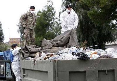 Italian soldiers collect garbage in Quarto near Naples