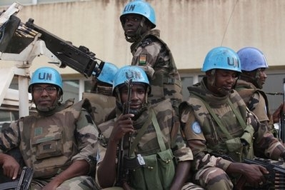 United Nations troops from Niger prepare for a patrol on the streets of Abidjan
