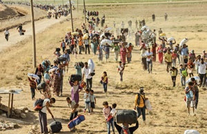 هزاران نفر از کردهای سوریه با حملات داعش به روستاهای نزدیک مرز ترکیه مجبور به فرار  به ترکیه شده‌اند