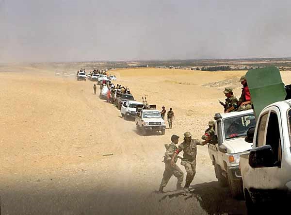 نیروهای شورشی موسوم به ارتش آزاد سوریه با حمایت ترکیه حملات گسترده‌ای را علیه کردهای سوریه انجام داد